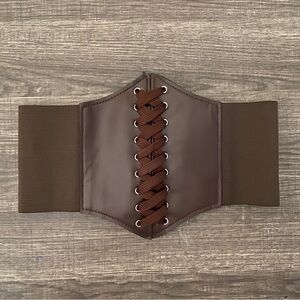 Brown Elastic corset belt with Velcro back. New in original bag.
